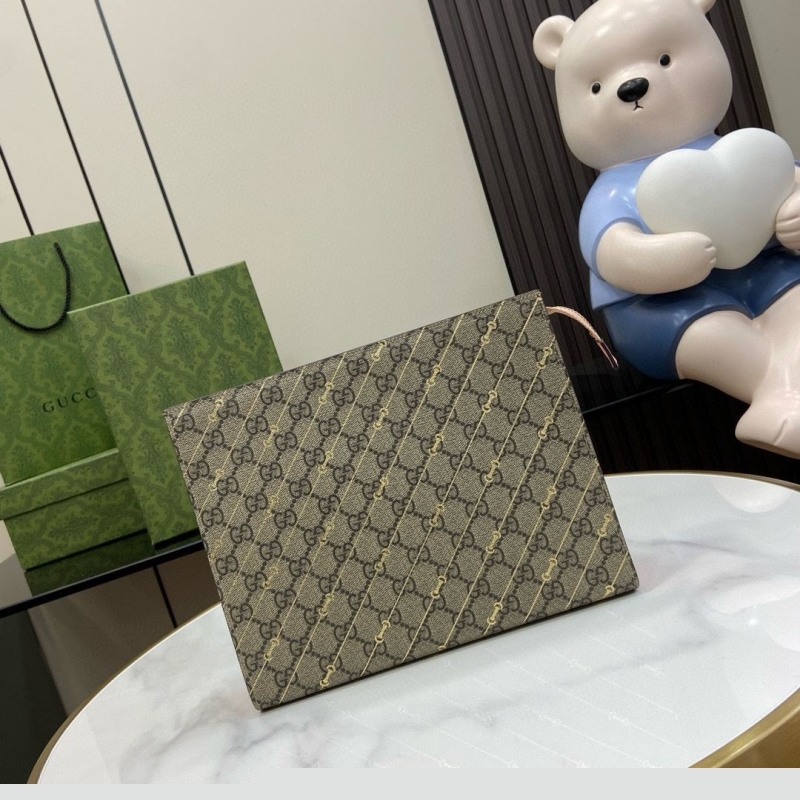 G*u*i clutch bags
